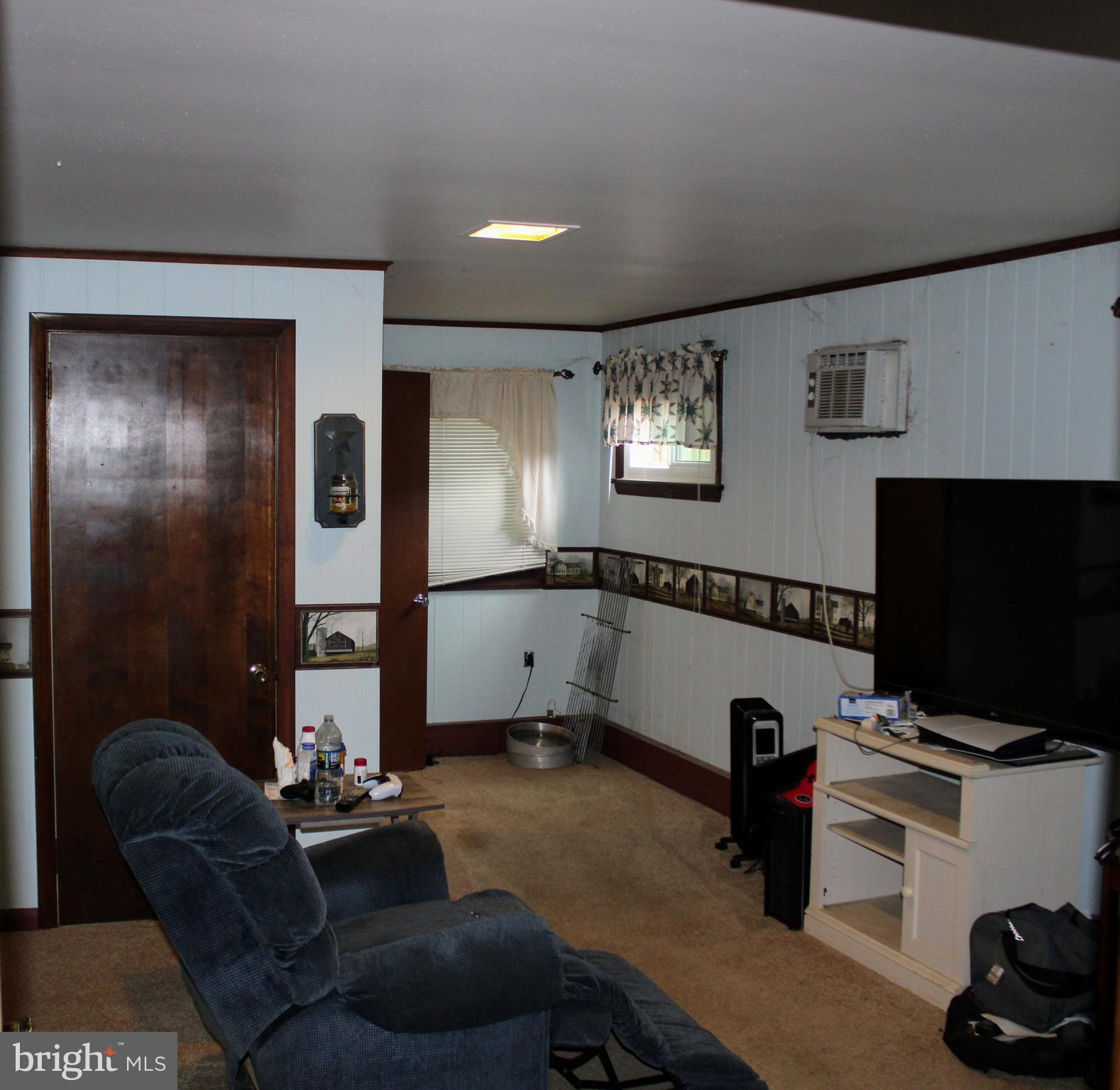 1928 New Bloomfield Road New Bloomfield, PA 17068 - Photo 9 of 15 a living room with furniture and a flat screen tv