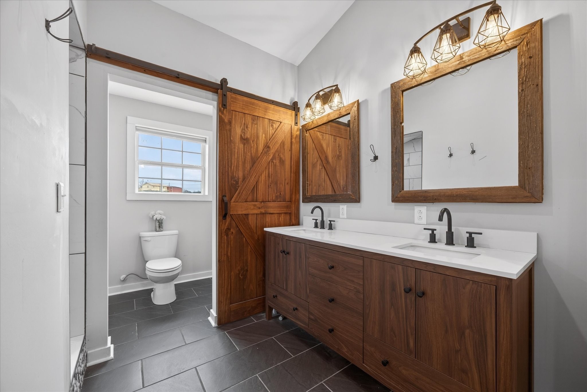 3212 Marthas Chapel Road Cunningham, TN 37052 - Photo 18 of 32 a bathroom with a toilet sink and mirror