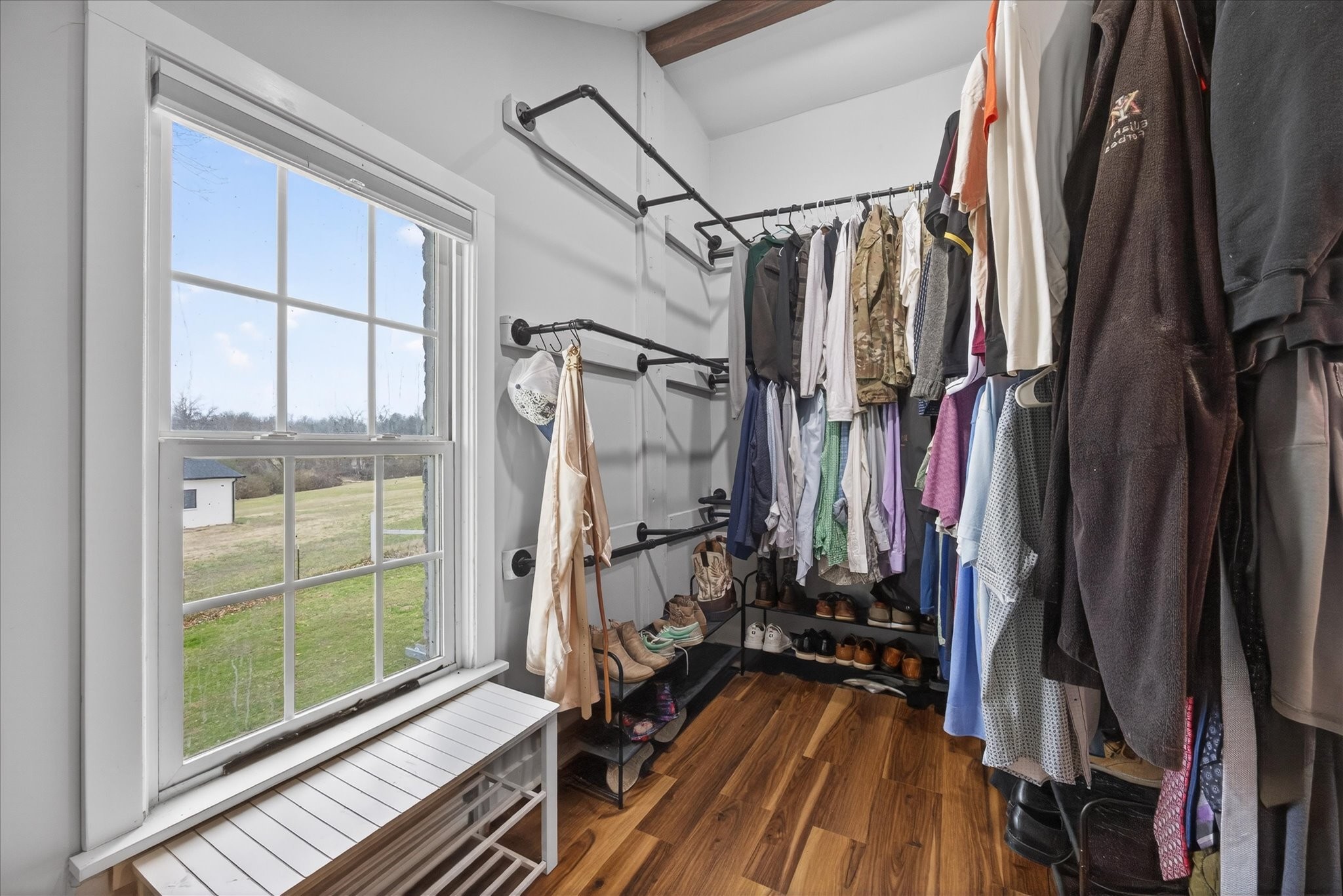 3212 Marthas Chapel Road Cunningham, TN 37052 - Photo 21 of 32 a view of walk in closet with clothes and shoes