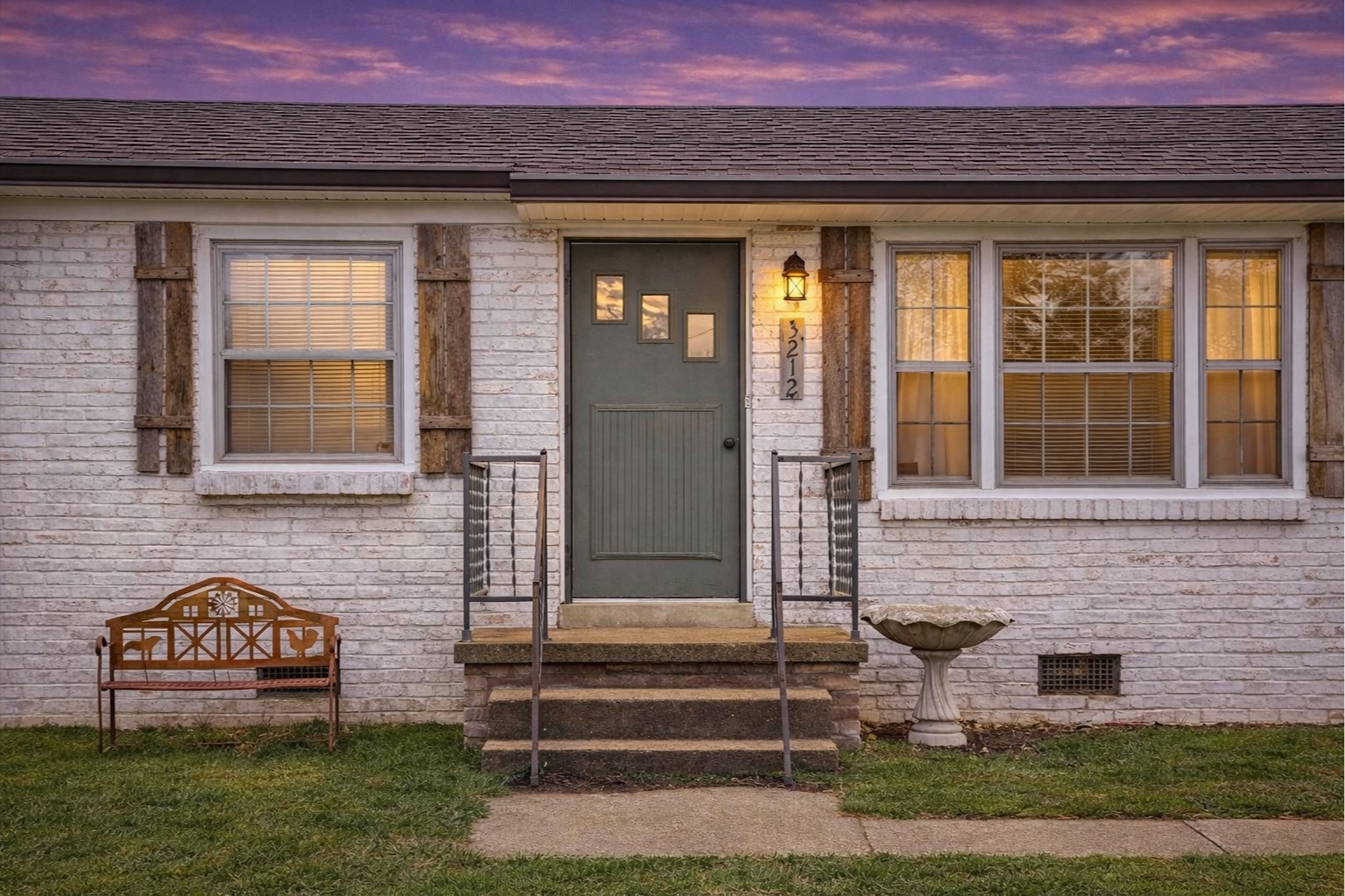 3212 Marthas Chapel Road Cunningham, TN 37052 - Photo 25 of 32 a front view of a house with a garden