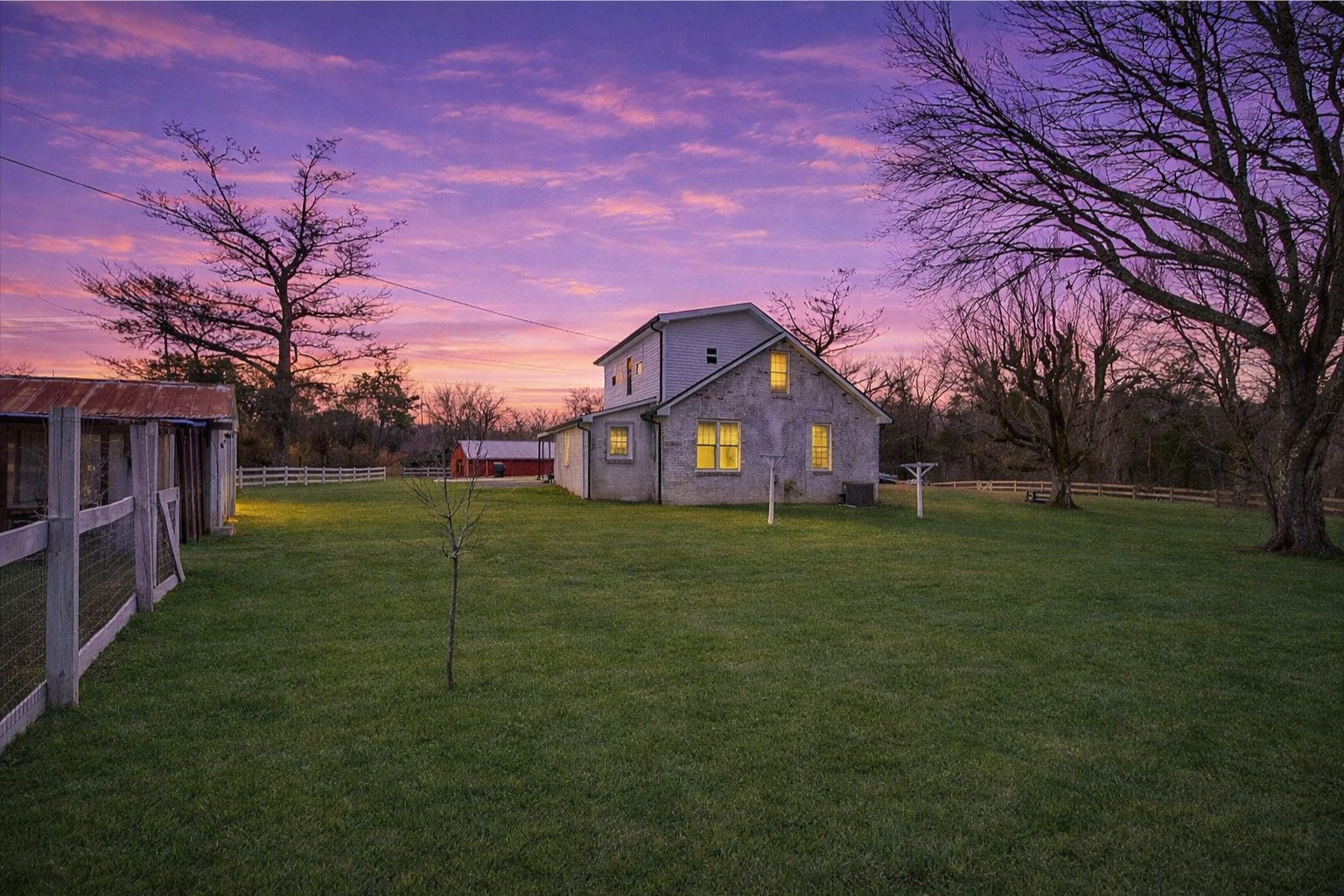 3212 Marthas Chapel Road Cunningham, TN 37052 - Photo 25 of 32 a front view of a house with a yard
