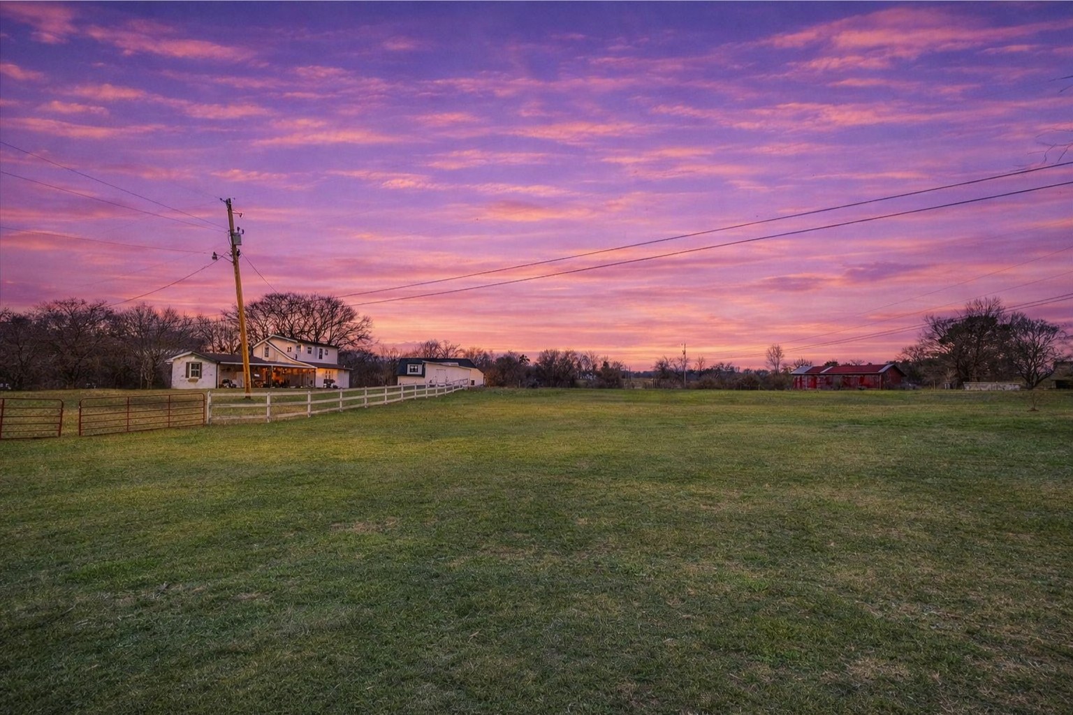 3212 Marthas Chapel Road Cunningham, TN 37052 - Photo 31 of 32 a view of a lake with a house in the background