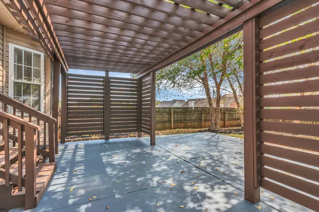 a view of backyard with green space