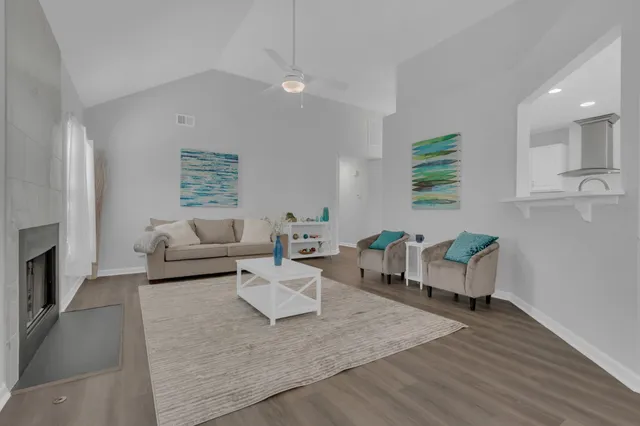 a living room with furniture and a couch