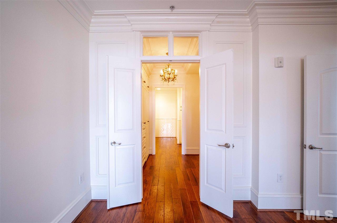 710 Independence Place, Unit 407 Raleigh, NC 27603 - Photo 12 of 27 a view of hallway with wooden floor