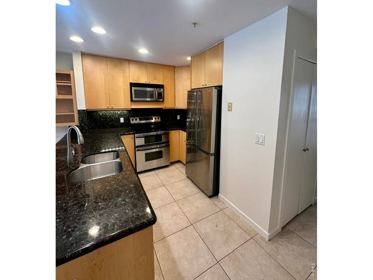 836 Walnut Street, Unit B Boulder, CO 80302 - Photo 8 of 36 Kitchen w/ new fridge