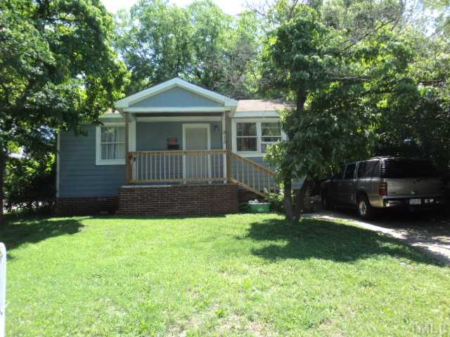 913 South State Street Raleigh, NC 27601 - Photo 1 of 7 a front view of a house with a garden and yard