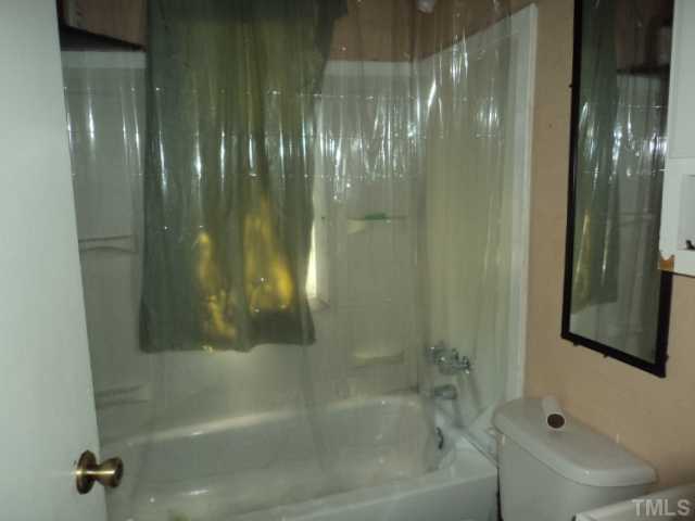 913 South State Street Raleigh, NC 27601 - Photo 6 of 7 a bathroom with a shower