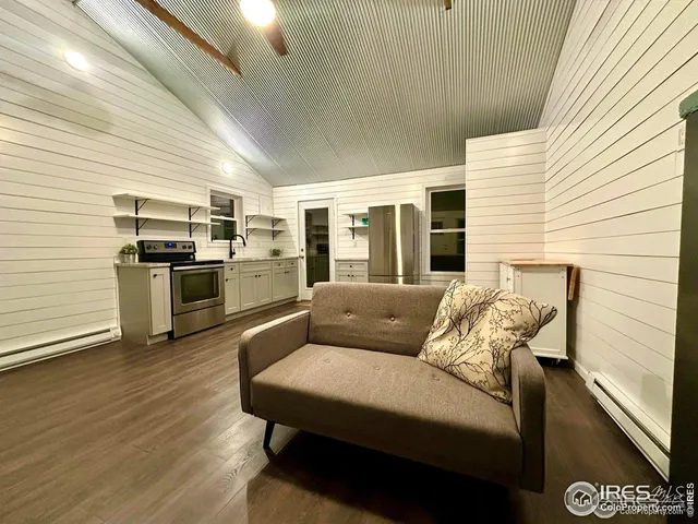 a kitchen with a sink and a stove