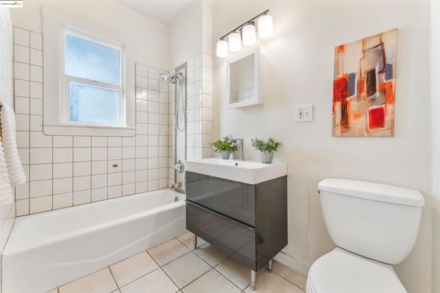 a bathroom with a toilet sink and bathtub