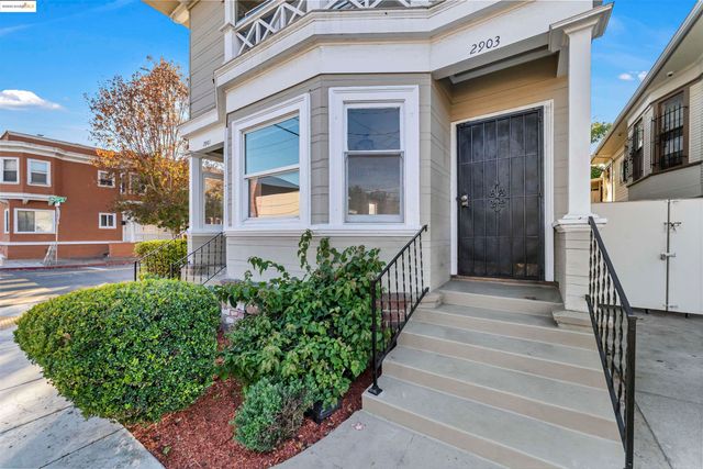 a view of a house with a garden