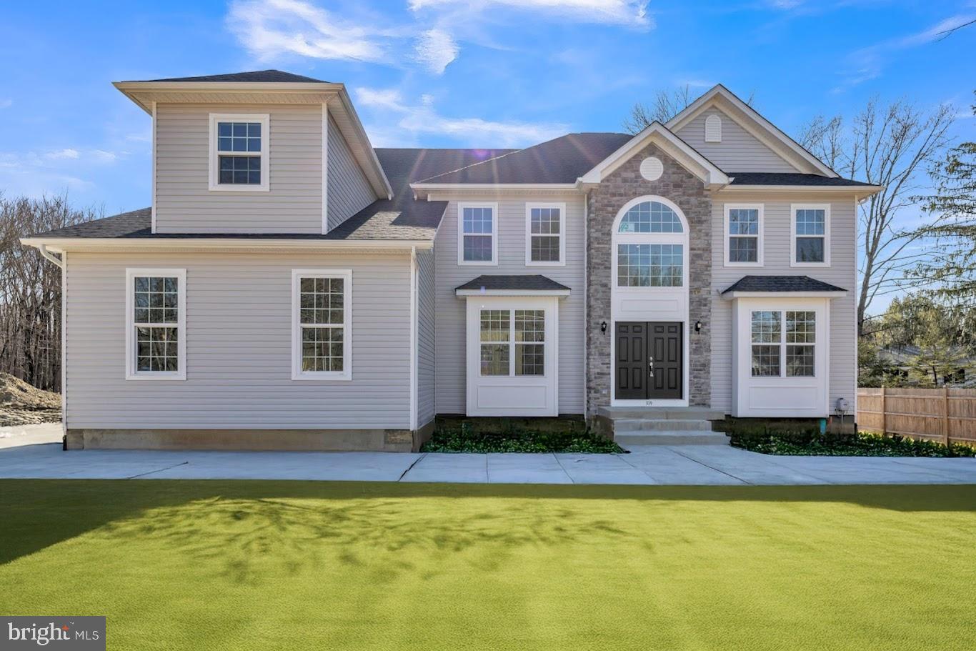 2 Martha Way Warwick, MD 21912 - Photo 2 of 12 a front view of a house with a yard
