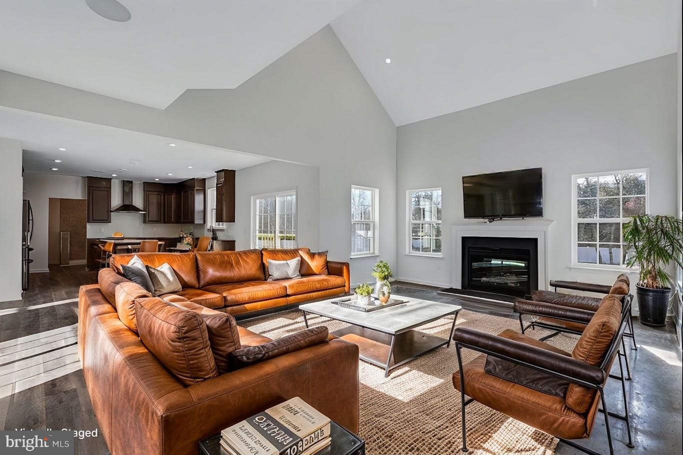 2 Martha Way Warwick, MD 21912 - Photo 9 of 12 a living room with furniture a fireplace and a flat screen tv