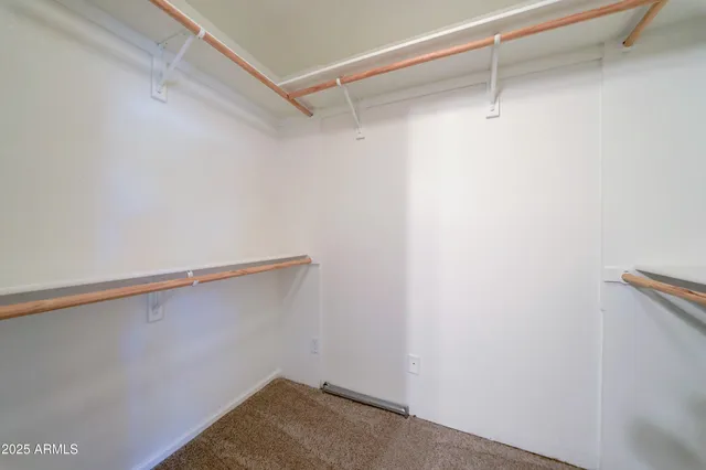 a view of a room with racks on the wall