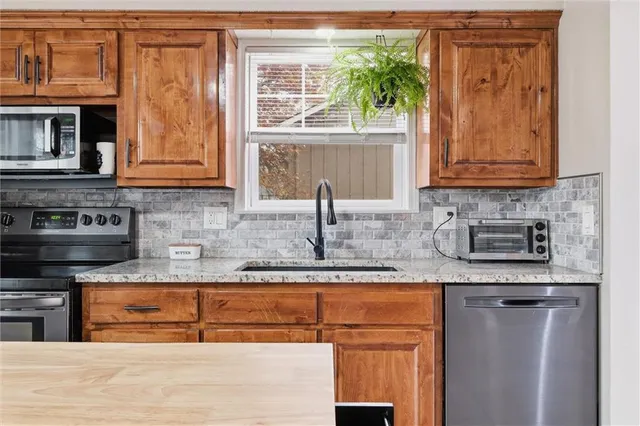 $310,000 | 302 Southeast Flagstone Street, Lee's Summit, MO 64063