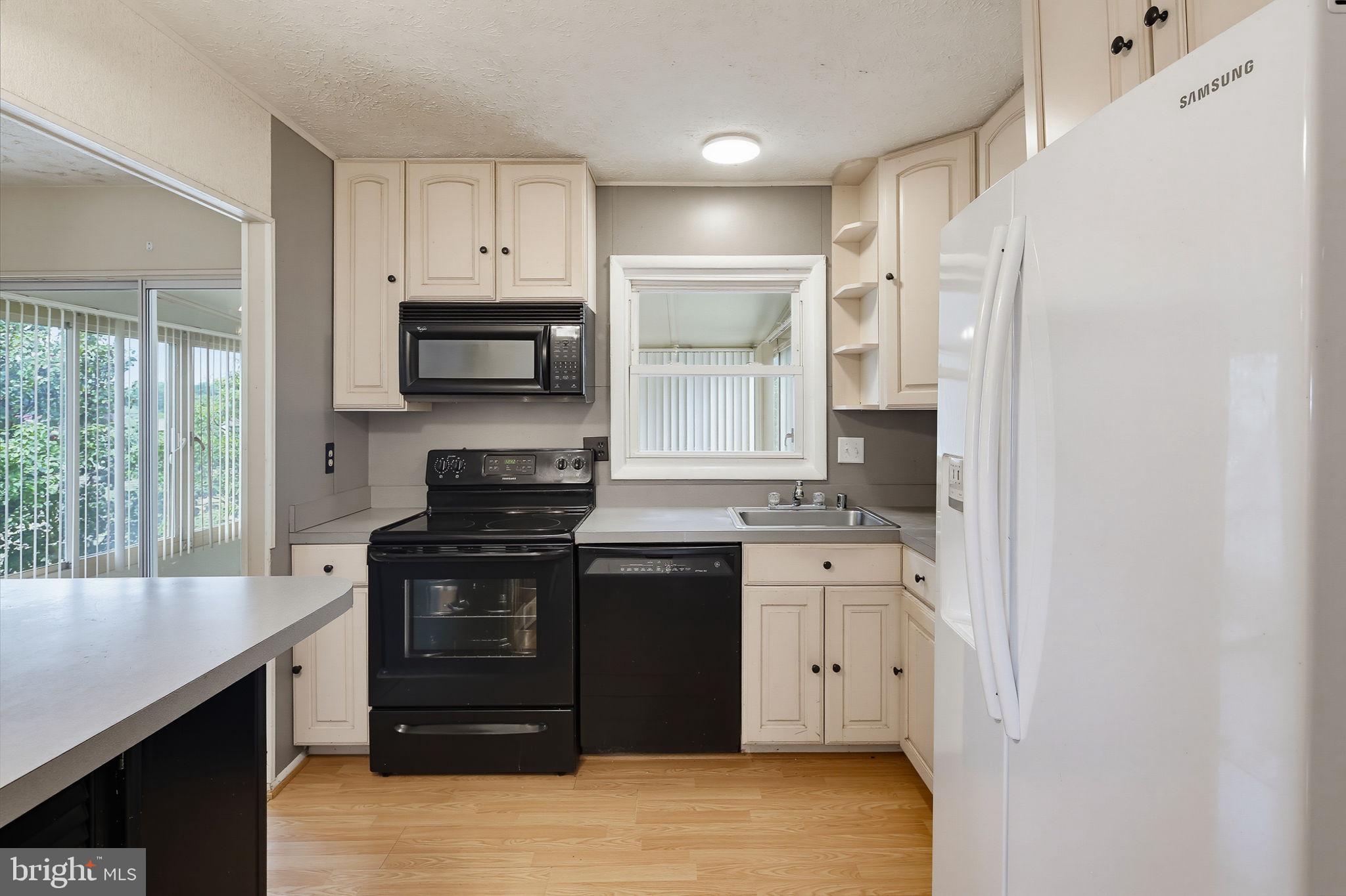 7802 Bastille Road Severn, MD 21144 - Photo 8 of 34 Charming kitchen with modern finishes.