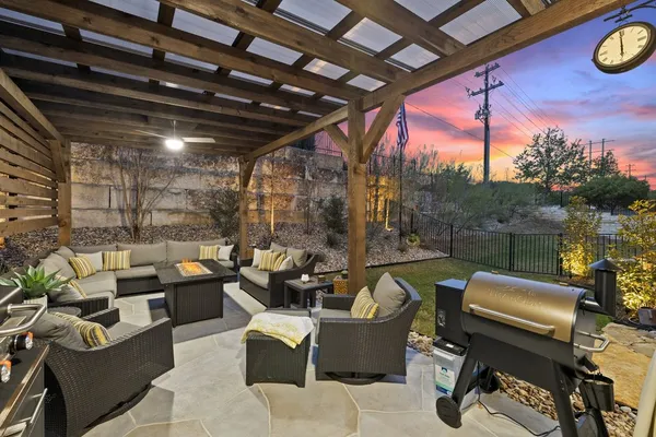a outdoor living space with patio furniture