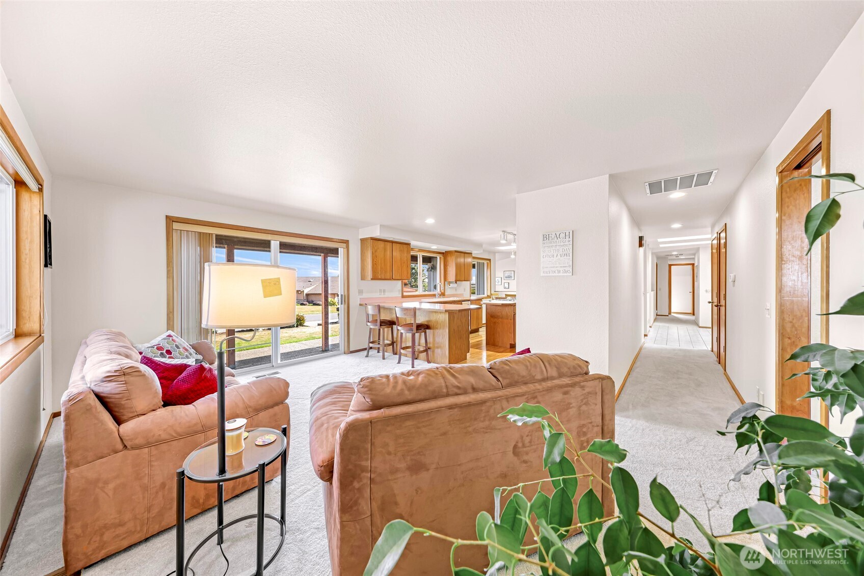 8059 Comox Road Blaine, WA 98230 - Photo 18 of 38 a living room with furniture and a flat screen tv