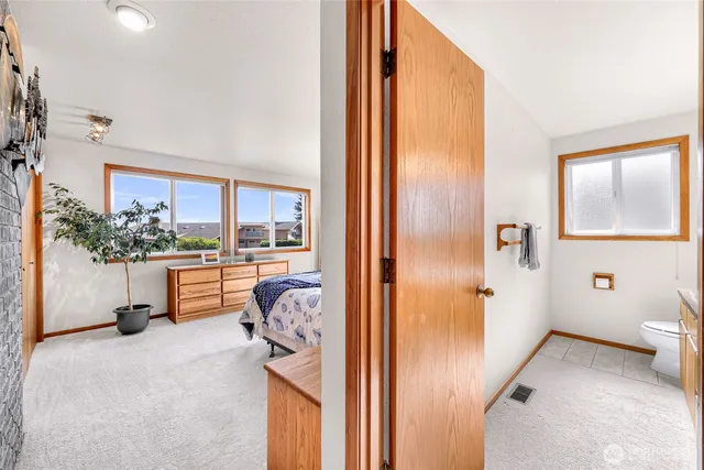 a bathroom with a tub and shower