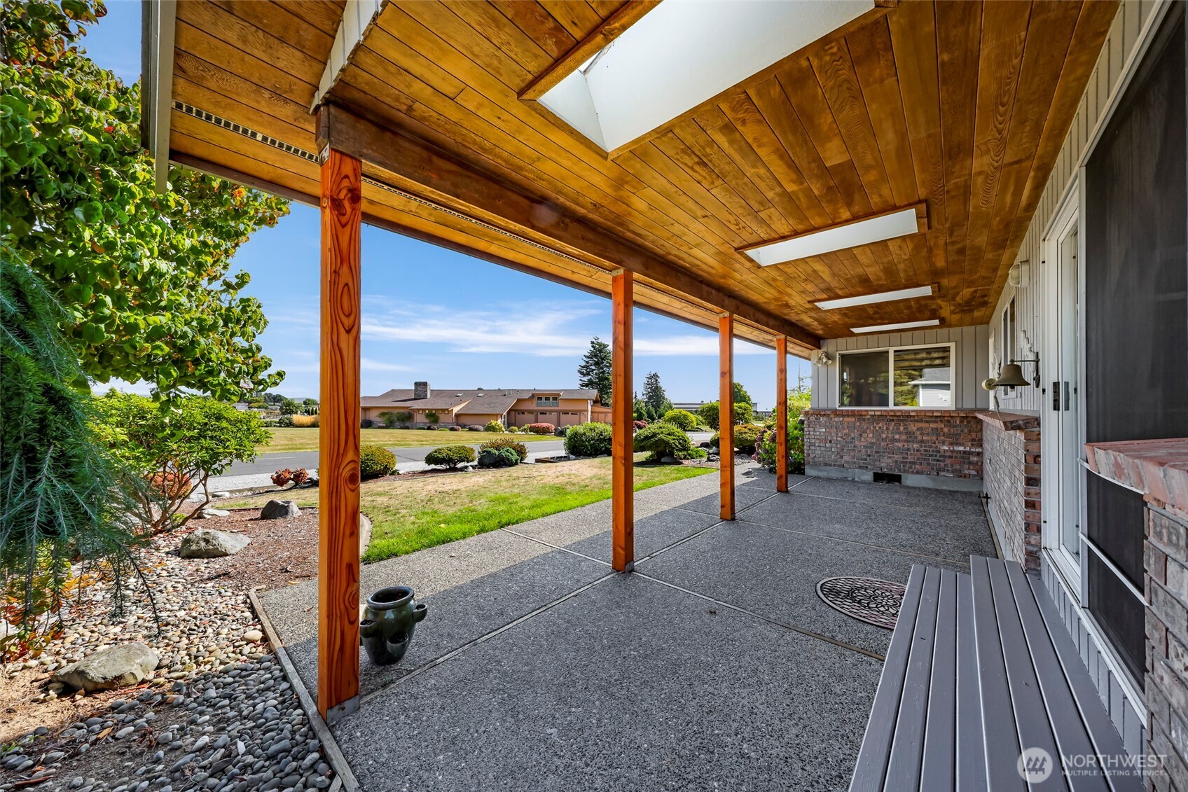 8059 Comox Road Blaine, WA 98230 - Photo 31 of 38 a view of a porch with furniture and garden