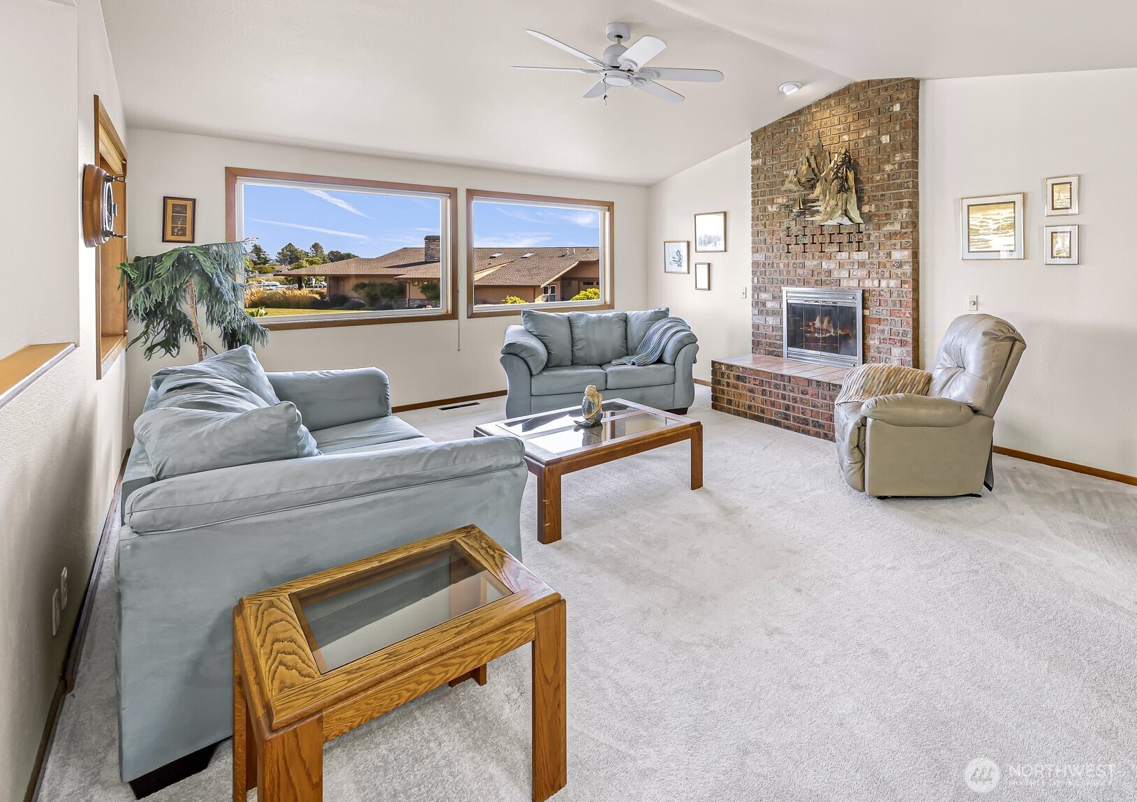 8059 Comox Road Blaine, WA 98230 - Photo 6 of 38 a living room with furniture and a fireplace