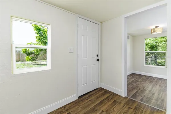 an empty room with windows