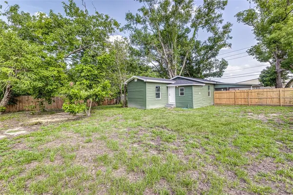 a view of a backyard with a garden