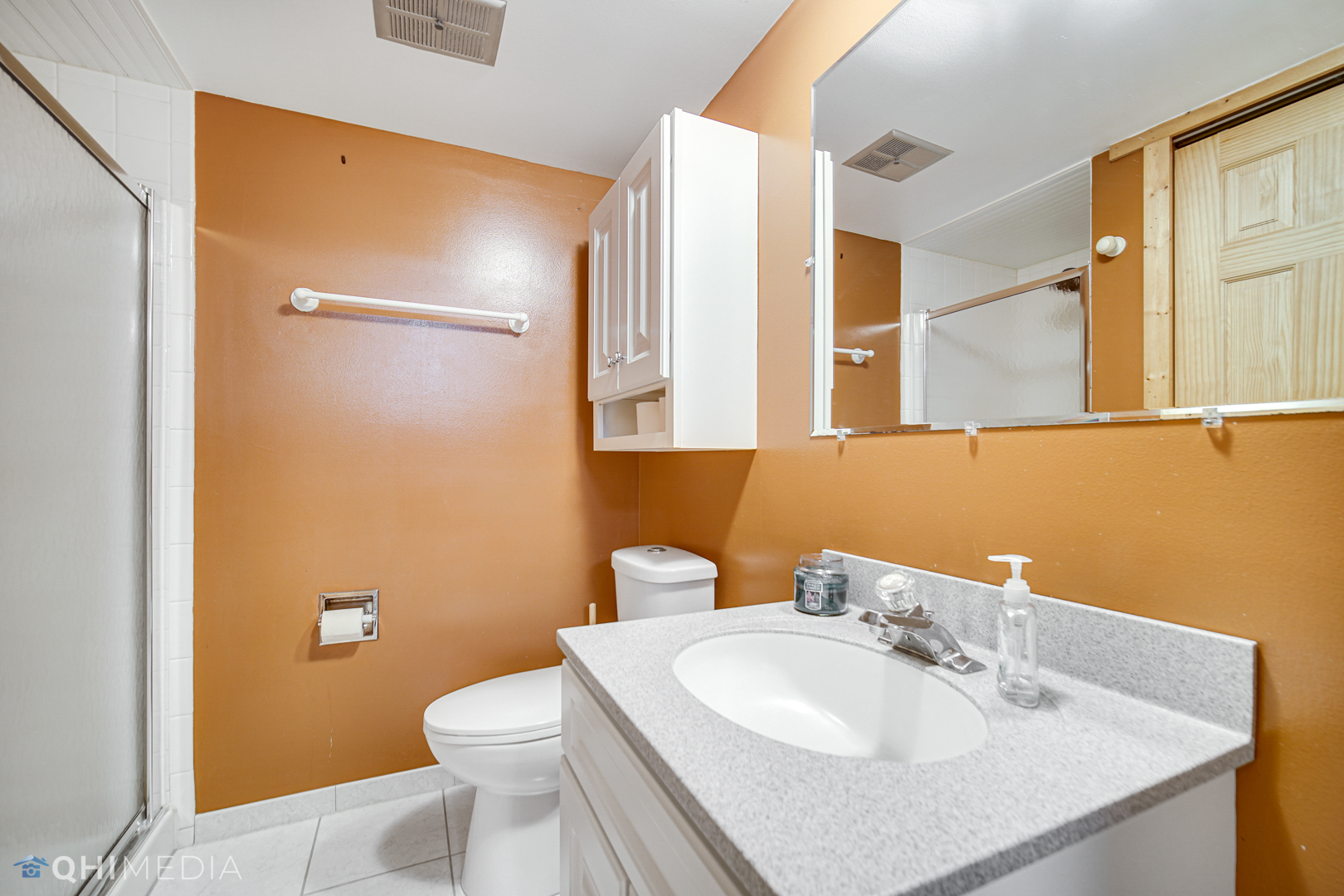 5244 170th Street Oak Forest, IL 60452 - Photo 12 of 24 a bathroom with a sink a toilet and mirror