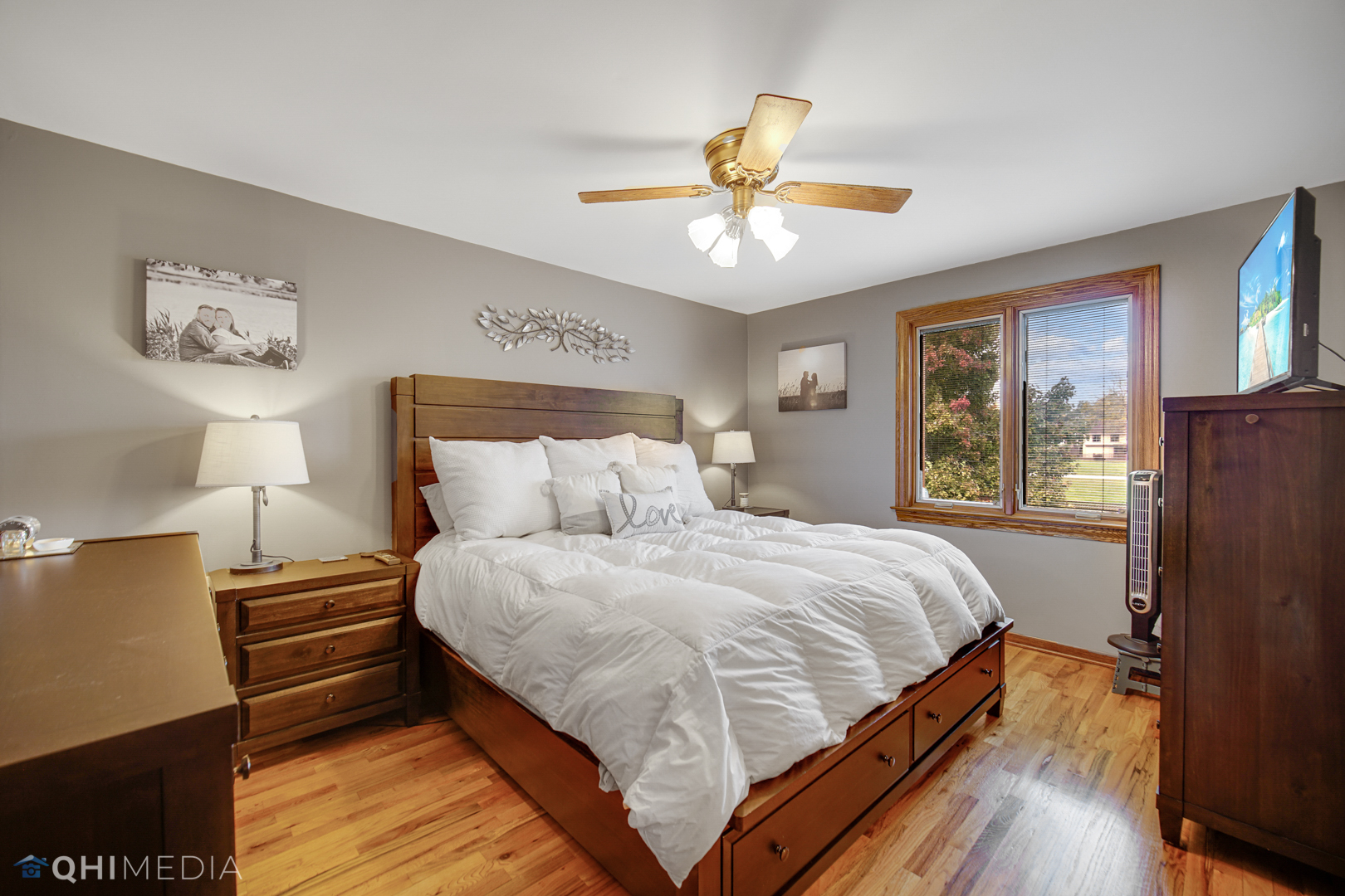 5244 170th Street Oak Forest, IL 60452 - Photo 13 of 24 a bedroom with a bed and wooden floor