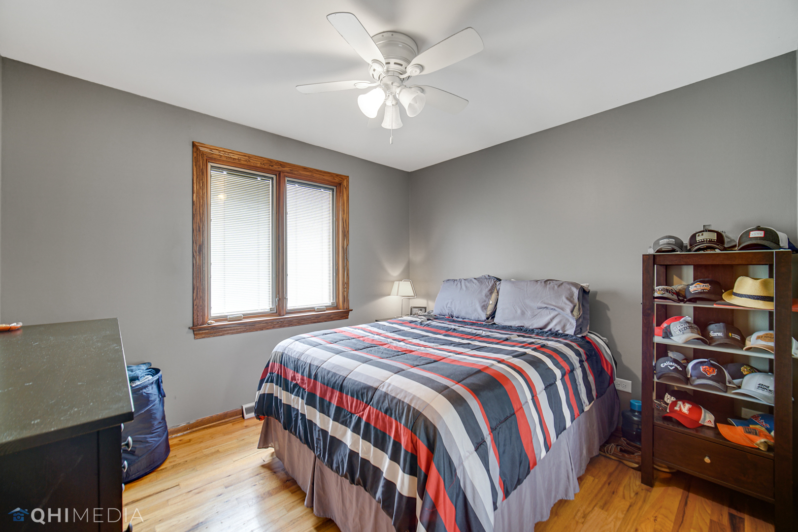 5244 170th Street Oak Forest, IL 60452 - Photo 15 of 24 a bedroom with a bed and a chandelier