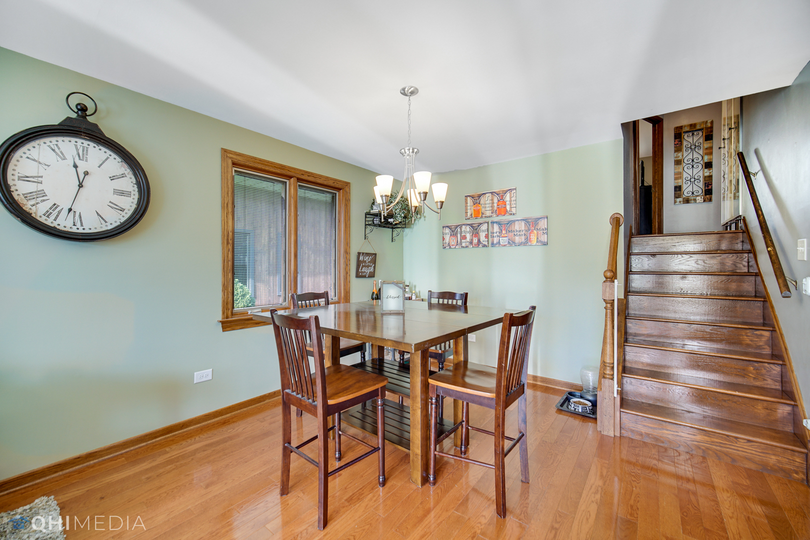 5244 170th Street Oak Forest, IL 60452 - Photo 7 of 24 a view of a dining room with furniture window and wooden floor
