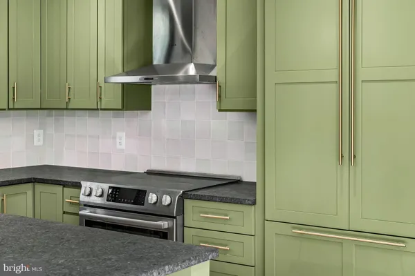 a view of a kitchen with washer and dryer