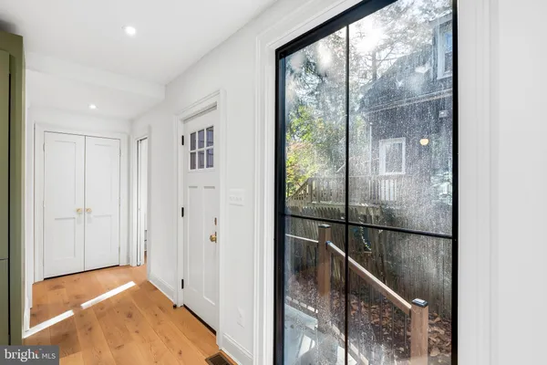 a view of hallway with natural light
