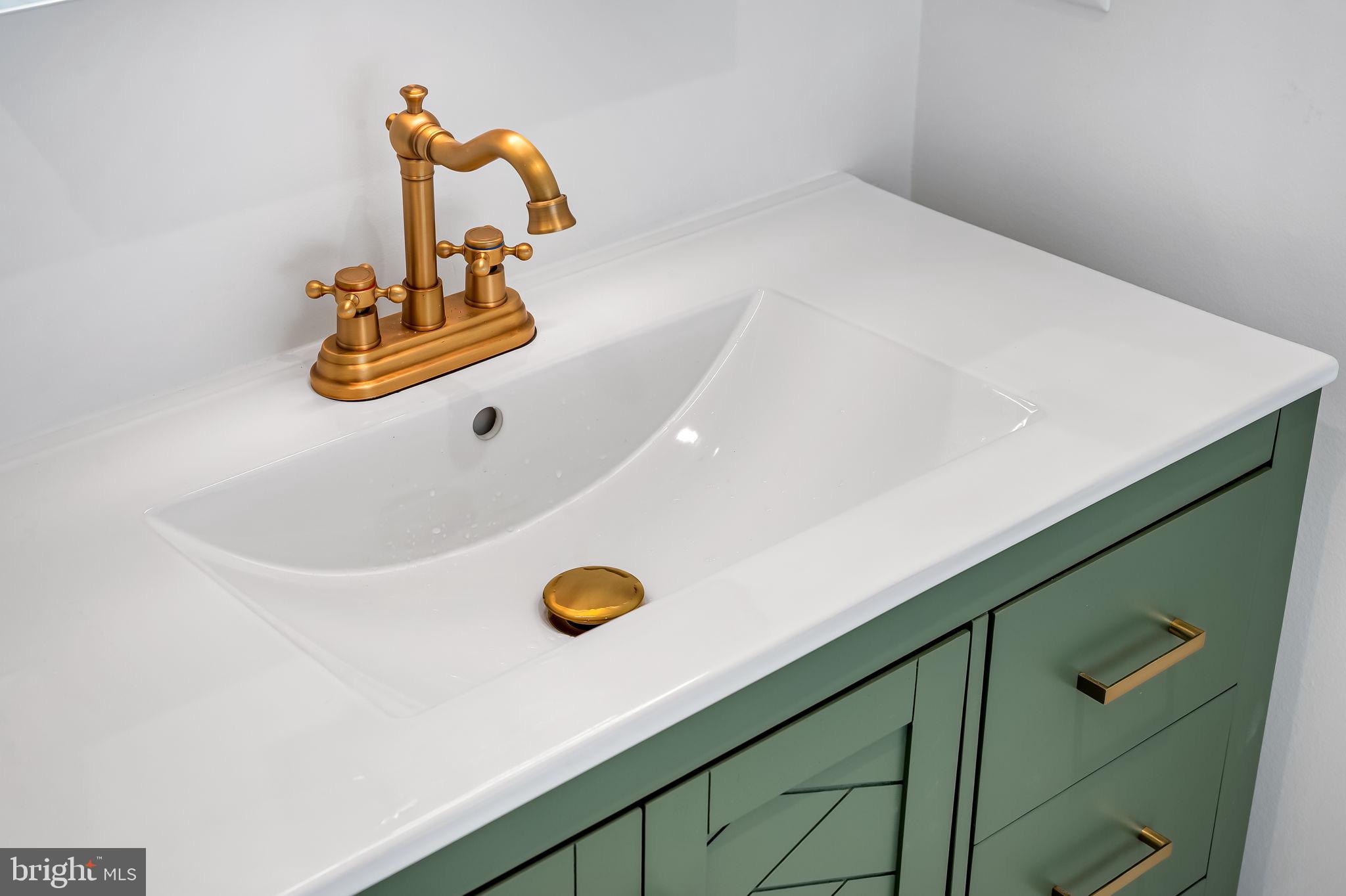 4629 Keswick Road Baltimore, MD 21210 - Photo 28 of 49 a bathroom with a sink