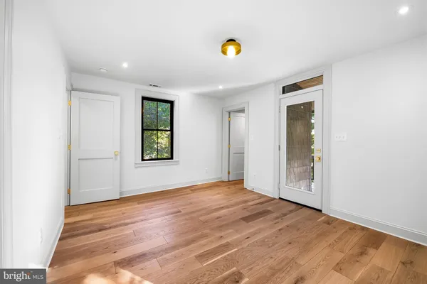 a view of an empty room and window