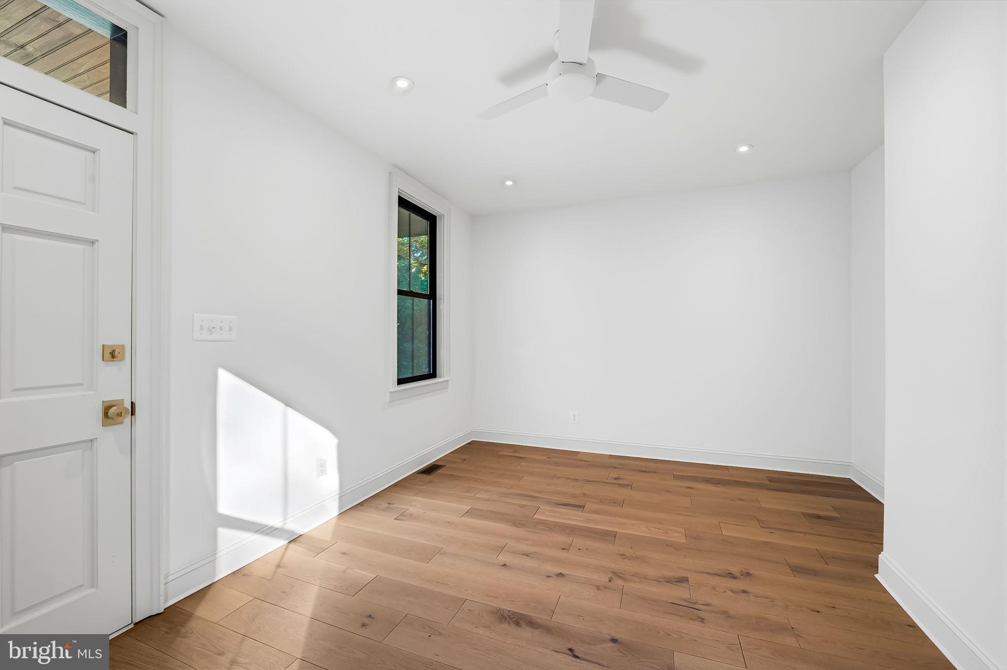 4629 Keswick Road Baltimore, MD 21210 - Photo 5 of 49 wooden floor in an empty room