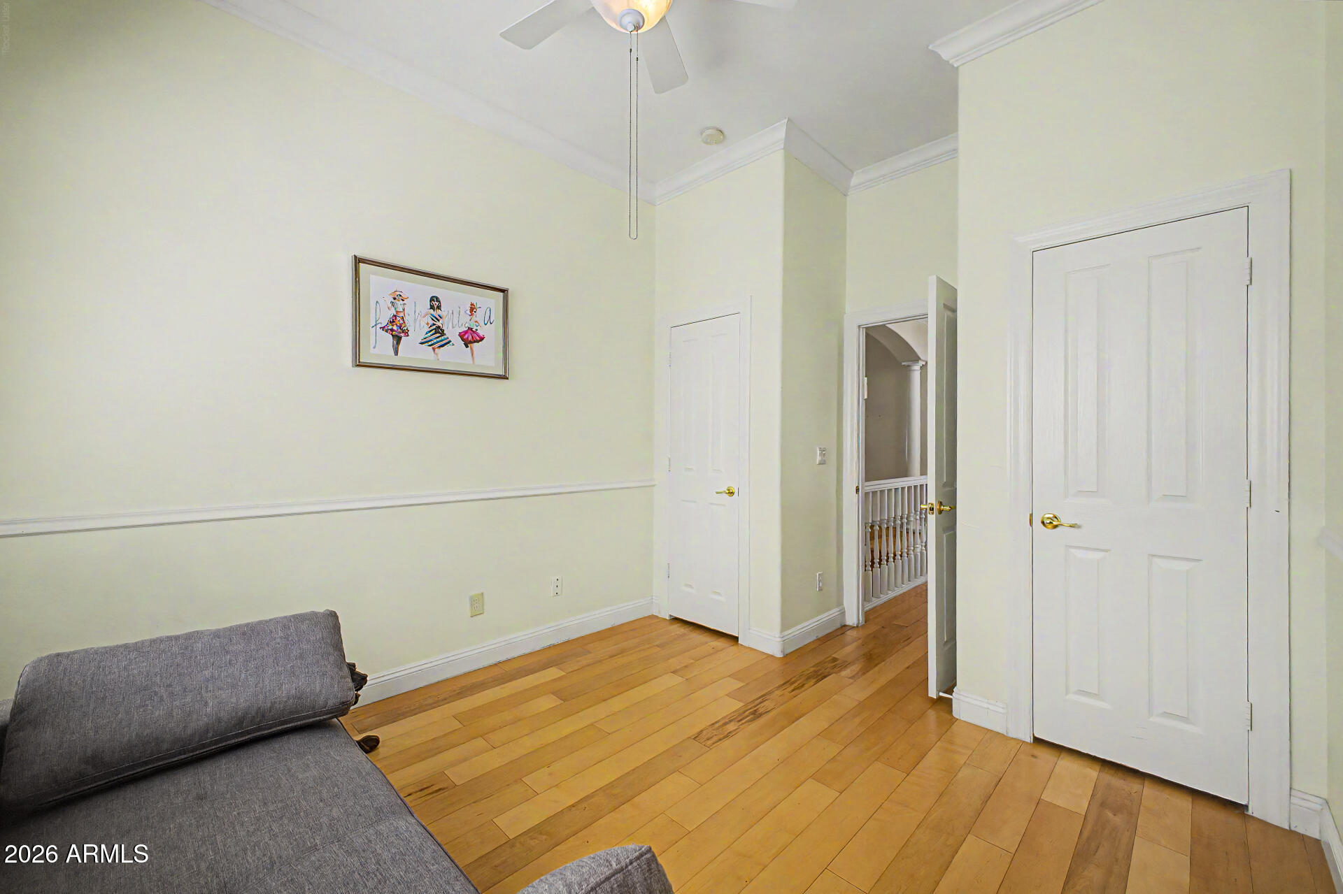 808 West Citrus Way Phoenix, AZ 85013 - Photo 21 of 35 a view of a room with wooden floor and cabinet