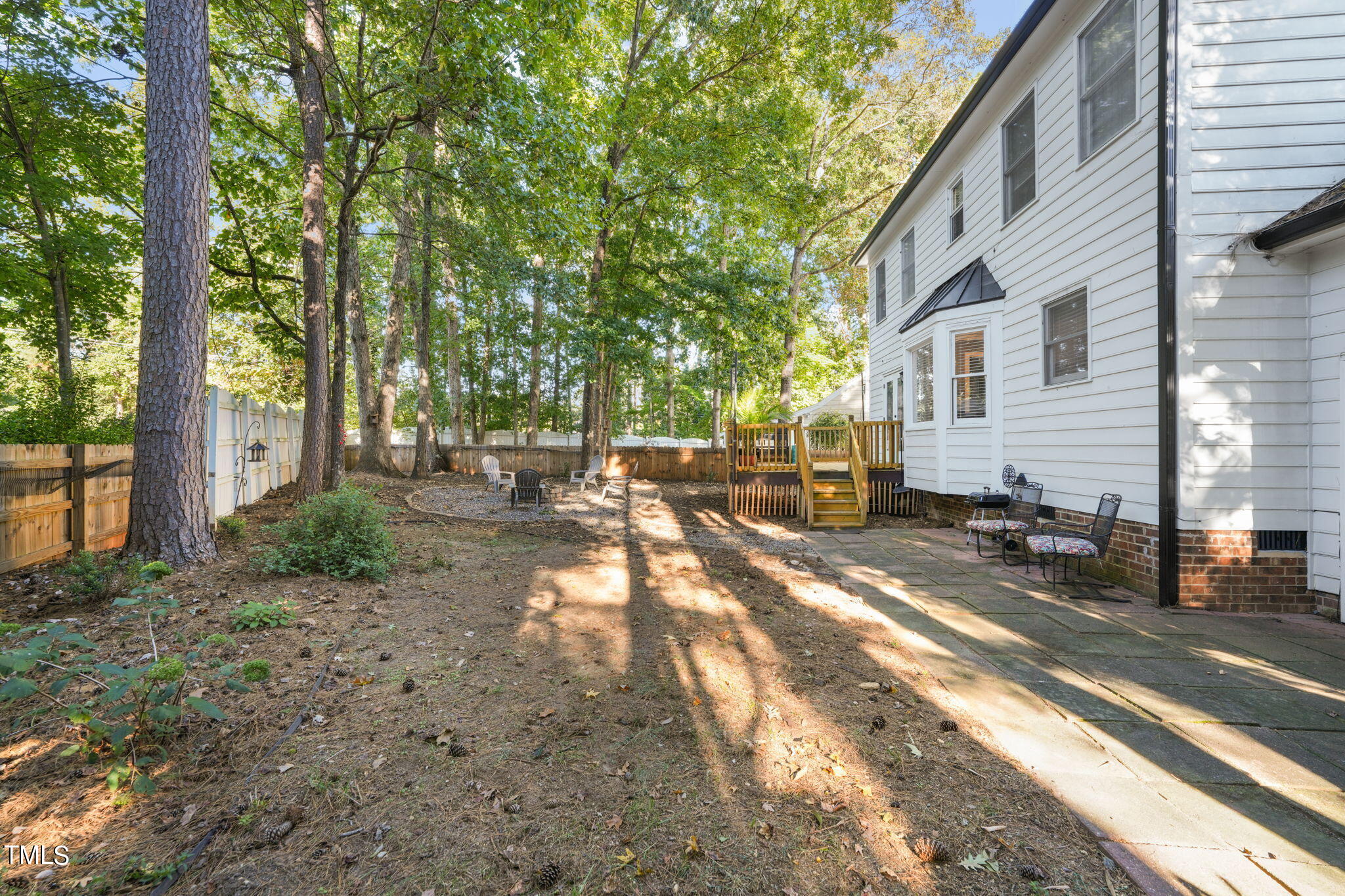 7125 Sandringham Drive Raleigh, NC 27613 - Photo 21 of 26 a view of a street with houses on both side