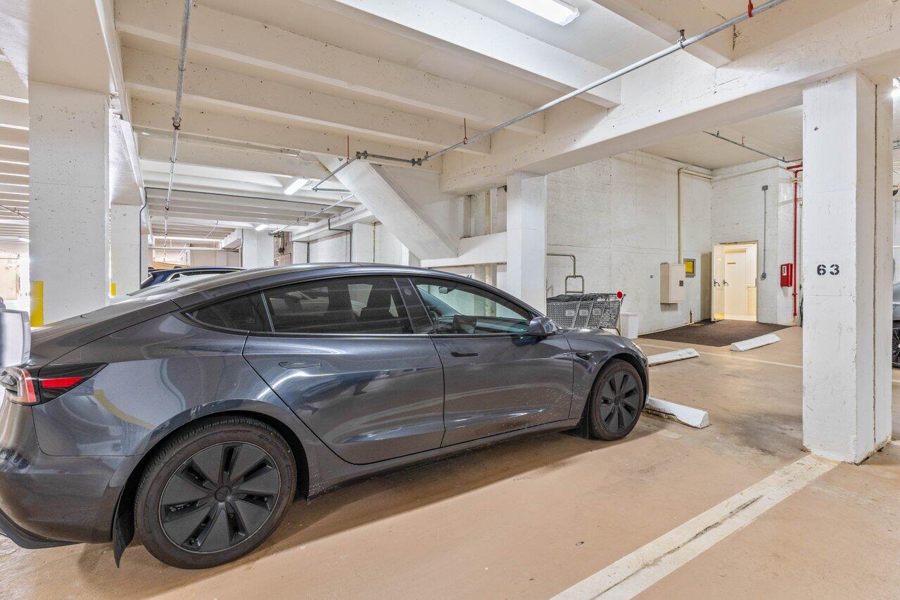 2917 South Ocean Boulevard, Unit 104 Highland Beach, FL 33487 - Photo 41 of 57 a car parked in a garage