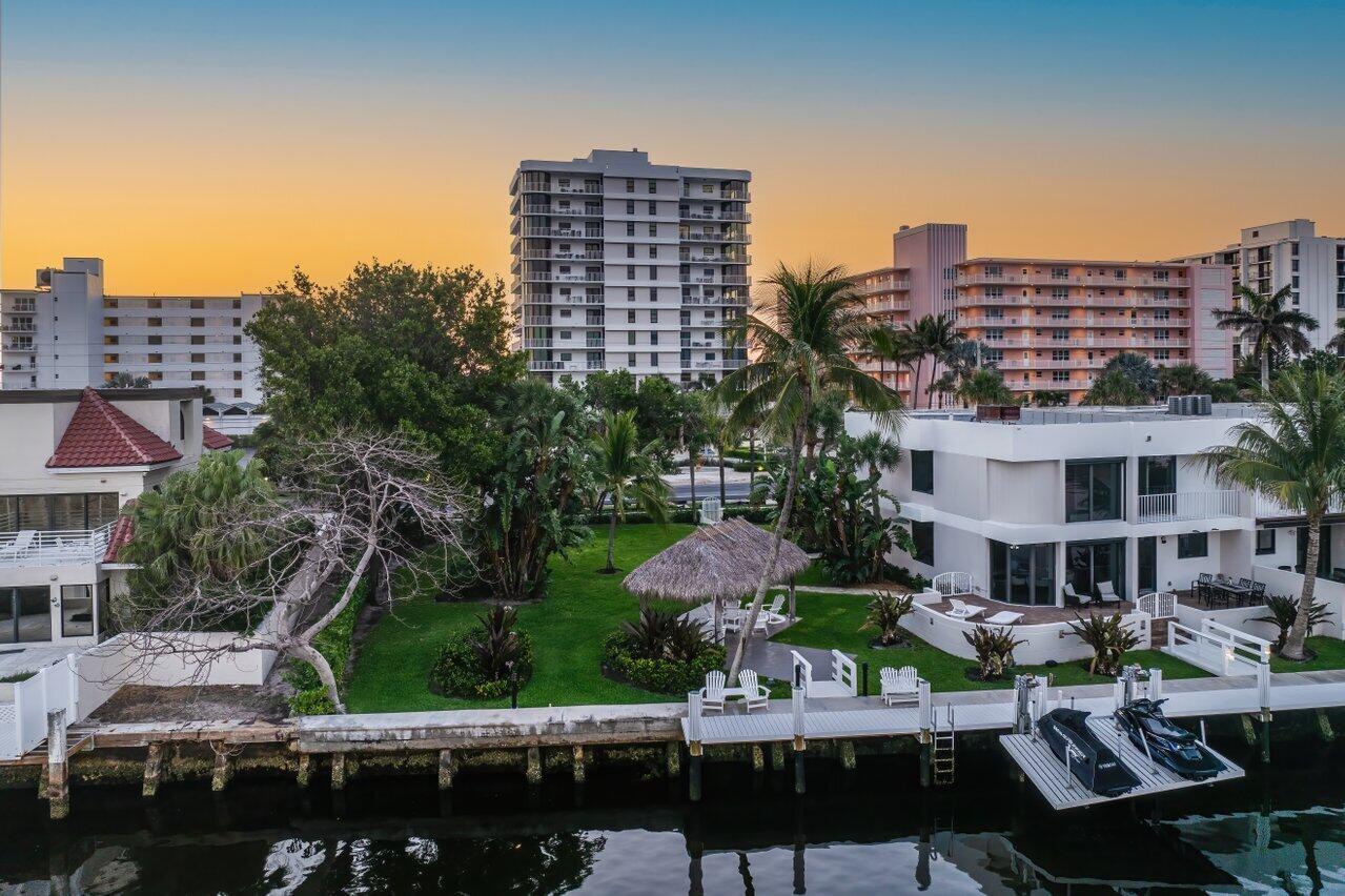 2917 South Ocean Boulevard, Unit 104 Highland Beach, FL 33487 - Photo 55 of 57 a view of building with outdoor space and sitting area