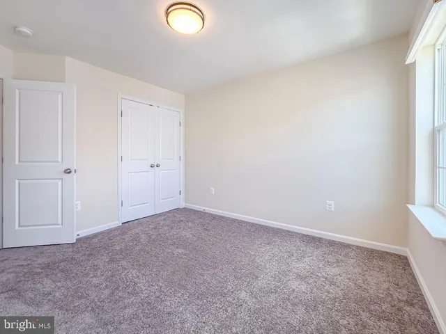 an empty room with window