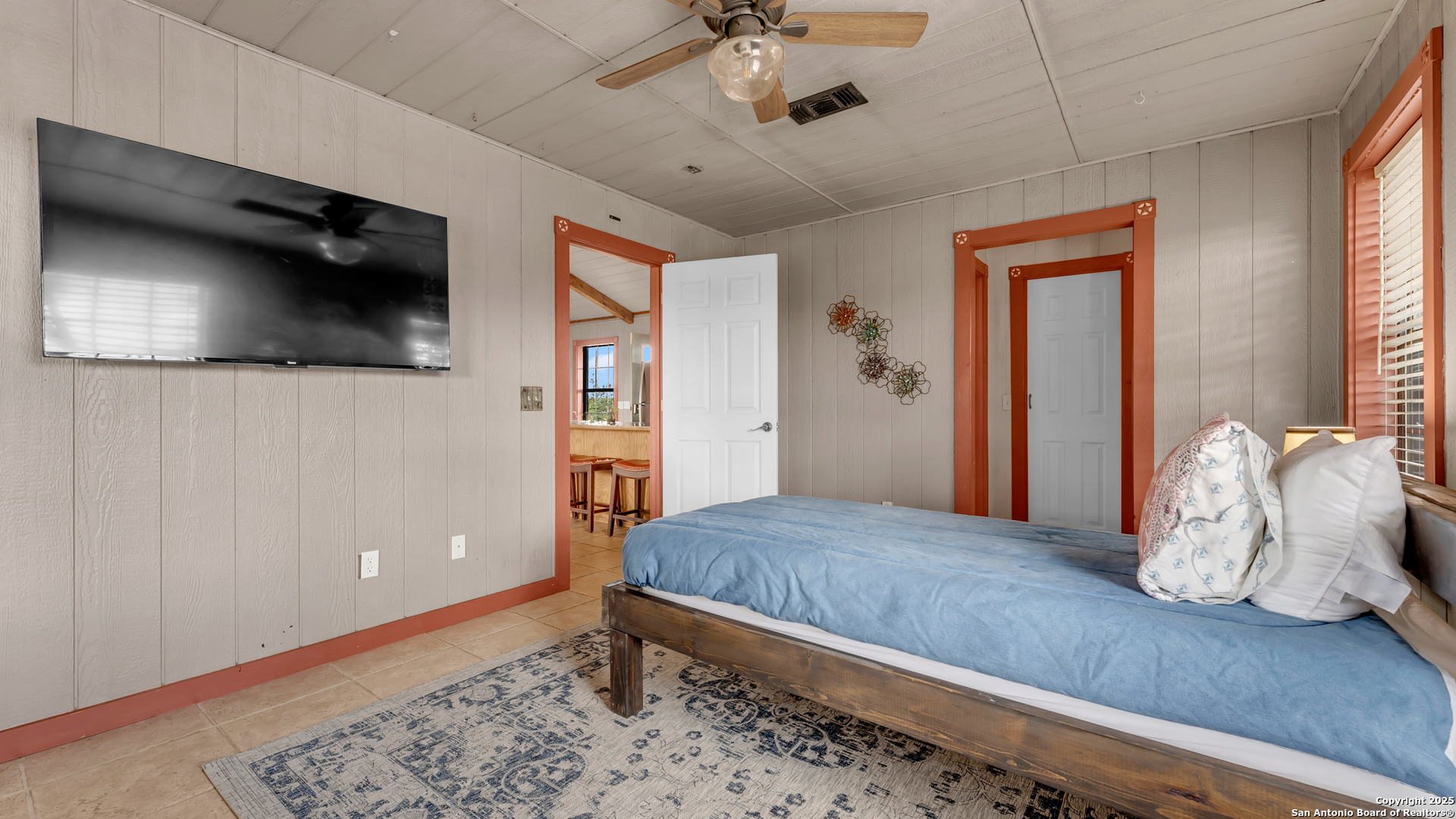 127 Offer Llano, TX 78643 - Photo 7 of 29 a bedroom with a bed and a flat screen tv