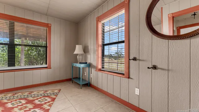 a view of a livingroom with furniture and window