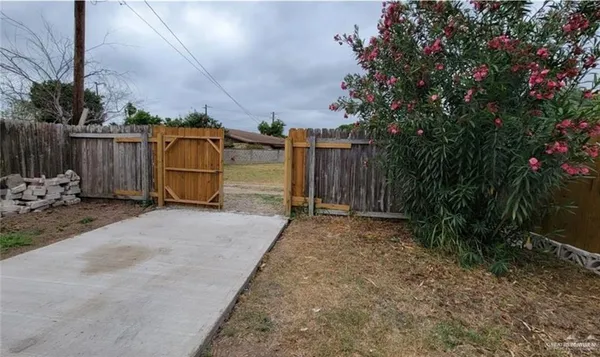 a view of front door and yard