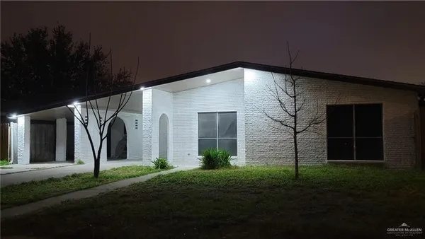 a house view with a garden space