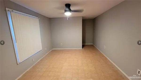 a kitchen with granite countertop a sink and a stove top oven
