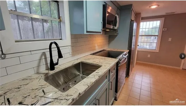 a bedroom with a wooden door