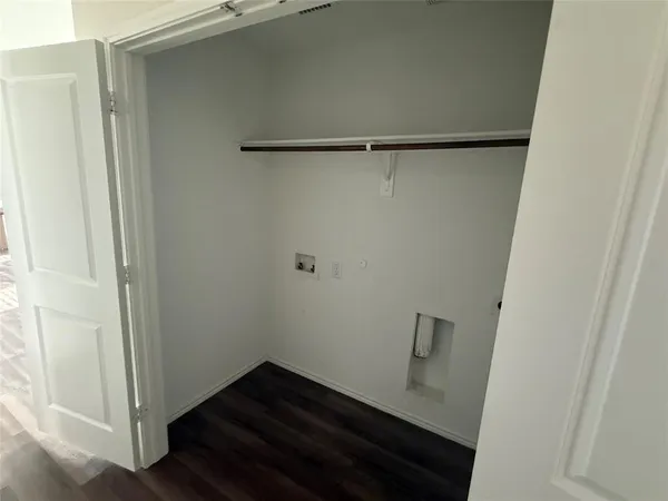 a view of small space with wooden floor