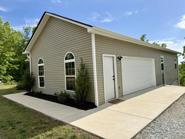 a front view of house with yard