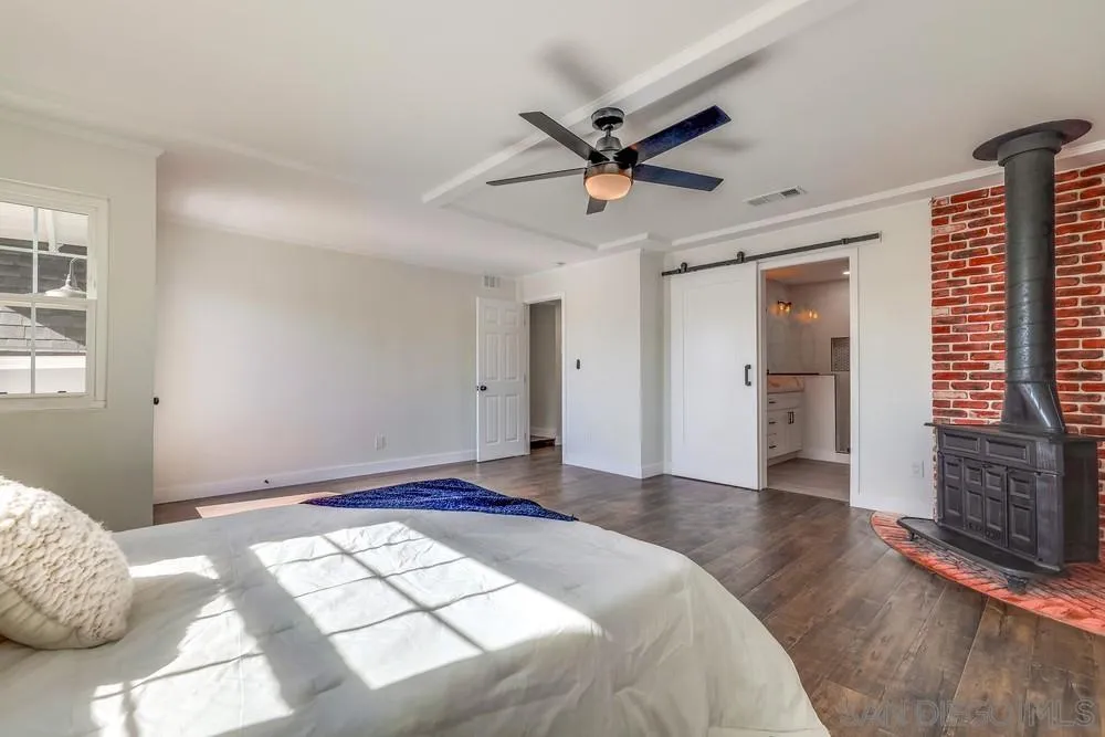 8779 Cordial Road El Cajon, CA 92021 - Photo 18 of 39 a view of a livingroom with wooden floor and a window